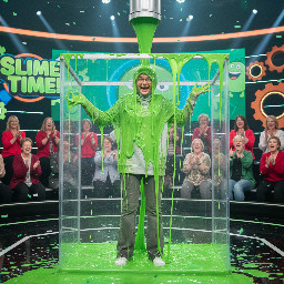 19 year old girl with light grey hijab and glasses light grey hoodie grey flair pants white sneakers