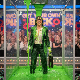 close up, singer sabrina dressed as businesswoman, slimed on get your own back